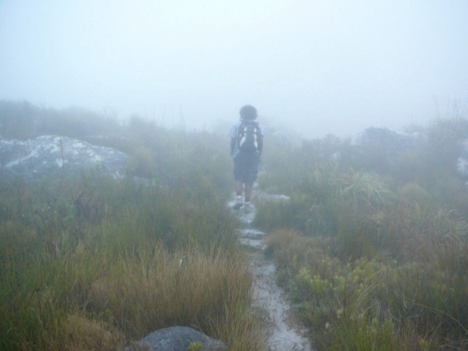 Trip photo #9/16 Amare hiking into the mist...