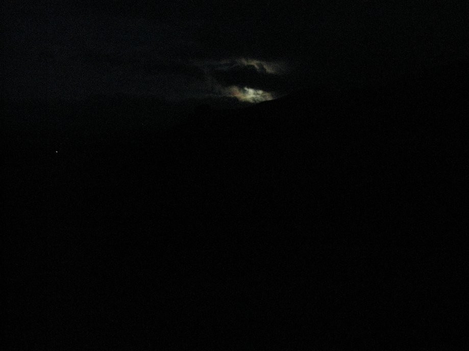 Trip photo #19/20 First glimpse of the full moon behind the clouds