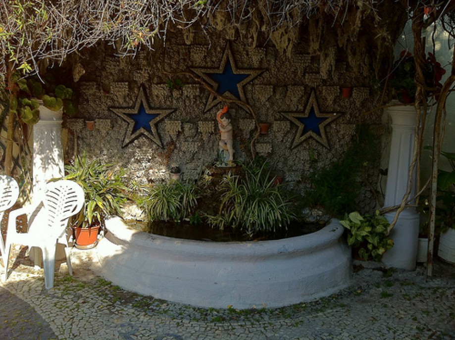 Trip photo #16/69 A decorated fountain in Vivenda Rosalina's garden (Bairro Estrela d'Ouro)